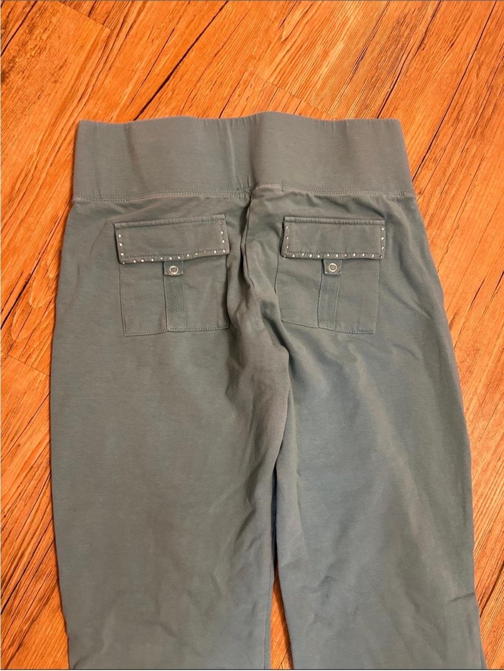 BCBGMaxAzria Teal Flared Leggings with Gold Floral Detail - Picture 4 of 6